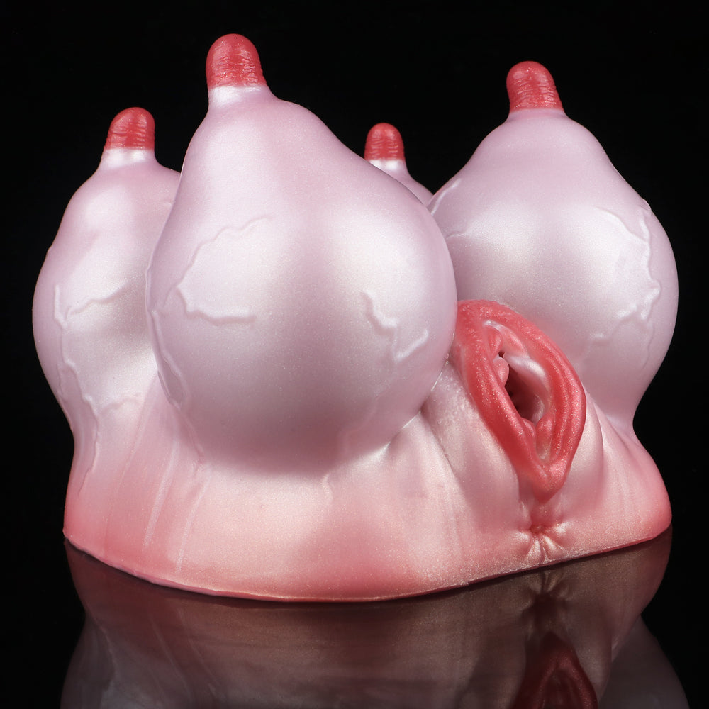 Pink silicone anatomical toy viewed from front, red inner opening