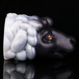 Animal figurine with black-and-white swirled mane, orange eye detail, side profile