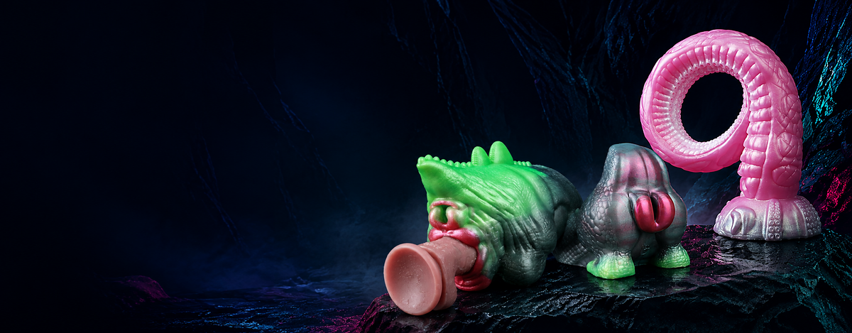 Lord Octopus tentacle dildo with Green Dragon and Lizard Queen fantasy masturbators in a neon-lit cave DirtyToyz.com