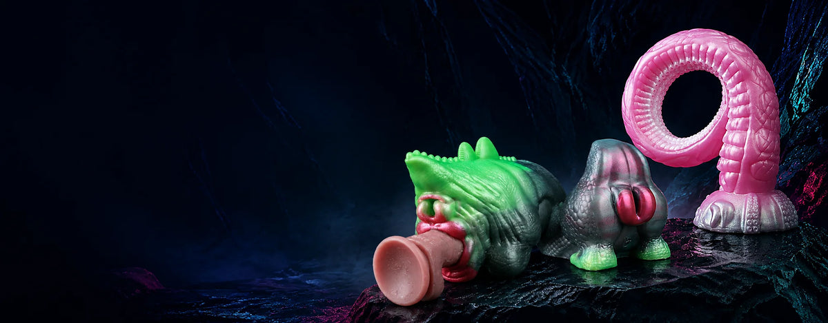 Lord Octopus tentacle dildo with Green Dragon and Lizard Queen fantasy masturbators in a neon-lit cave DirtyToyz.com