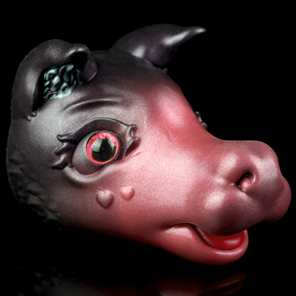 Squishy animal toy head, dark gray with pink snout and red-glossy eyes