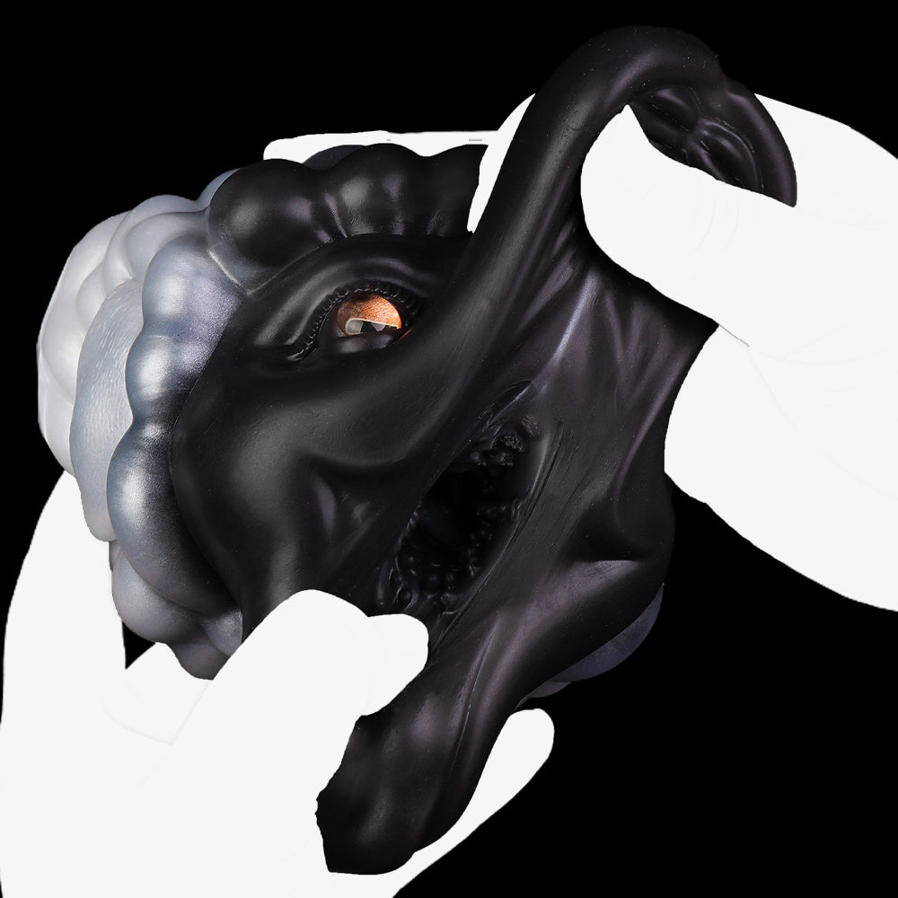 Animal figurine with black-and-white swirled mane and orange eyes, arched body pose