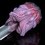 Angled view pink silicone octopus-shaped sex toy with bead-studded tentacles