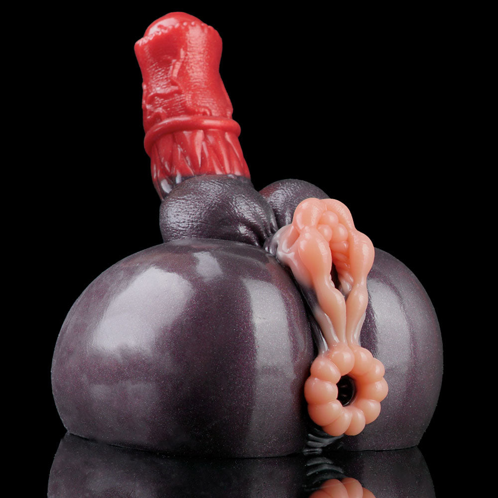 Adult novelty toy end view with dark gray body, red top, and pink textured loops