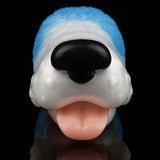 Dog-shaped toy front view with black nose, pink tongue, and light blue cap