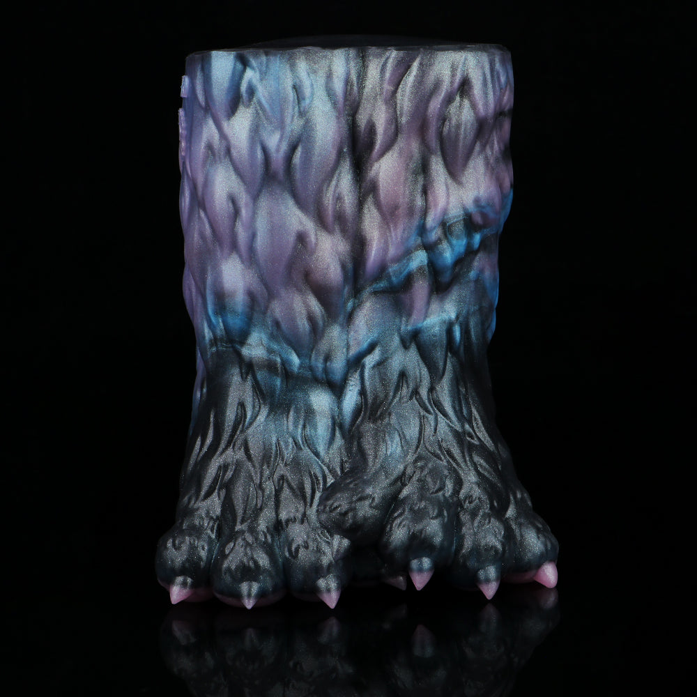 Back view of monster paw-shaped novelty toy with pink claw tips
