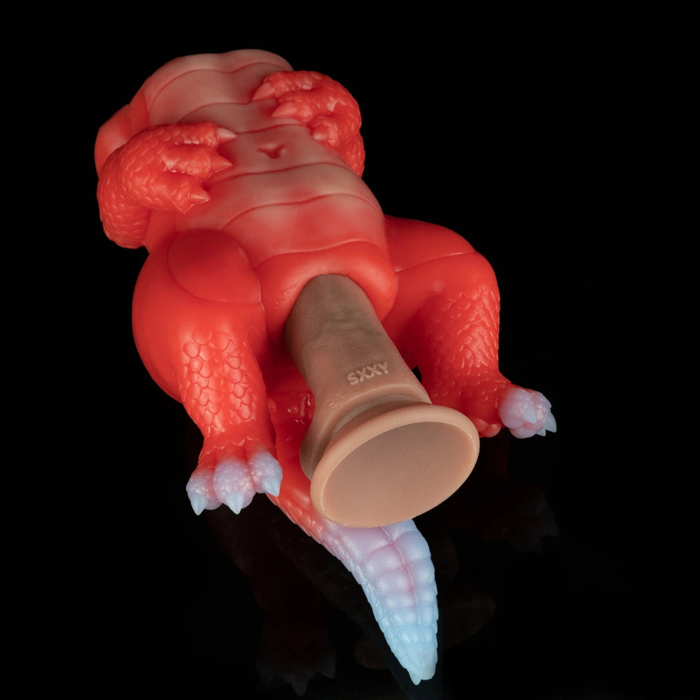 Red dragon fantasy sex toy rear view with open tip and detailed scale texture