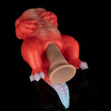 Red dragon fantasy sex toy rear view with open tip and detailed scale texture