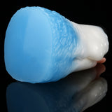 Dog-shaped toy side view with light blue back and white body texture, pink tongue visible