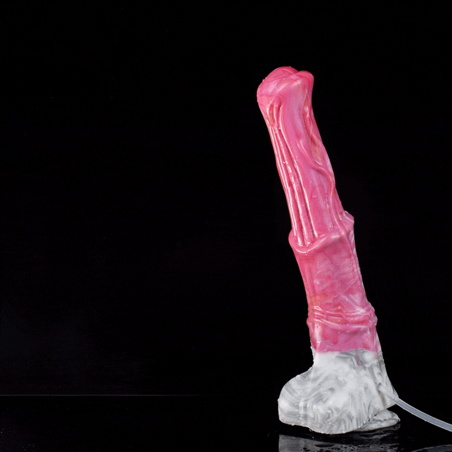 Pink translucent novelty dildo with ridged shaft and clear base, angled view.