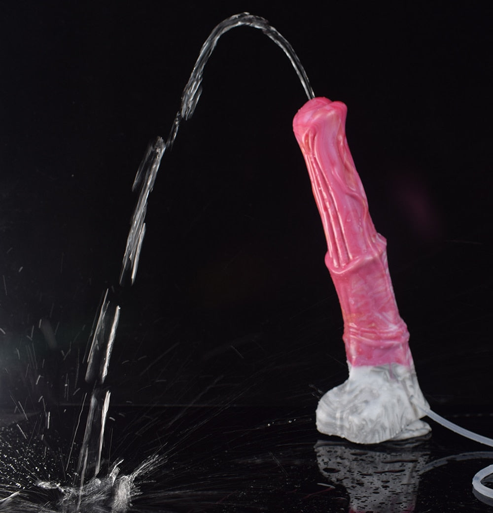 Pink translucent dildo with clear suction tube and white marbled base, side view