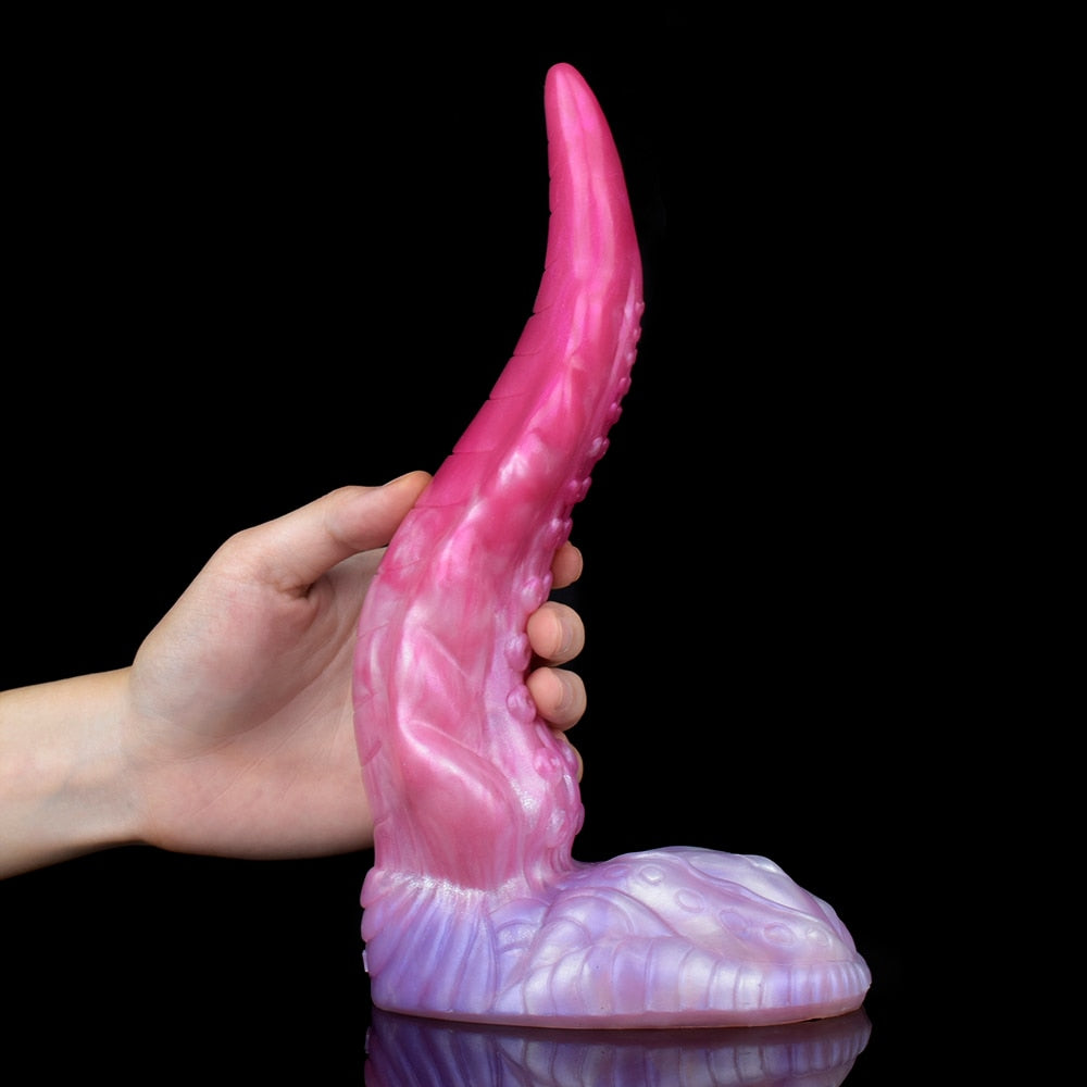 Oktopus-Buttplug in gebogener Form, mit rippenartigem Muster und eingravierten Details, pink
