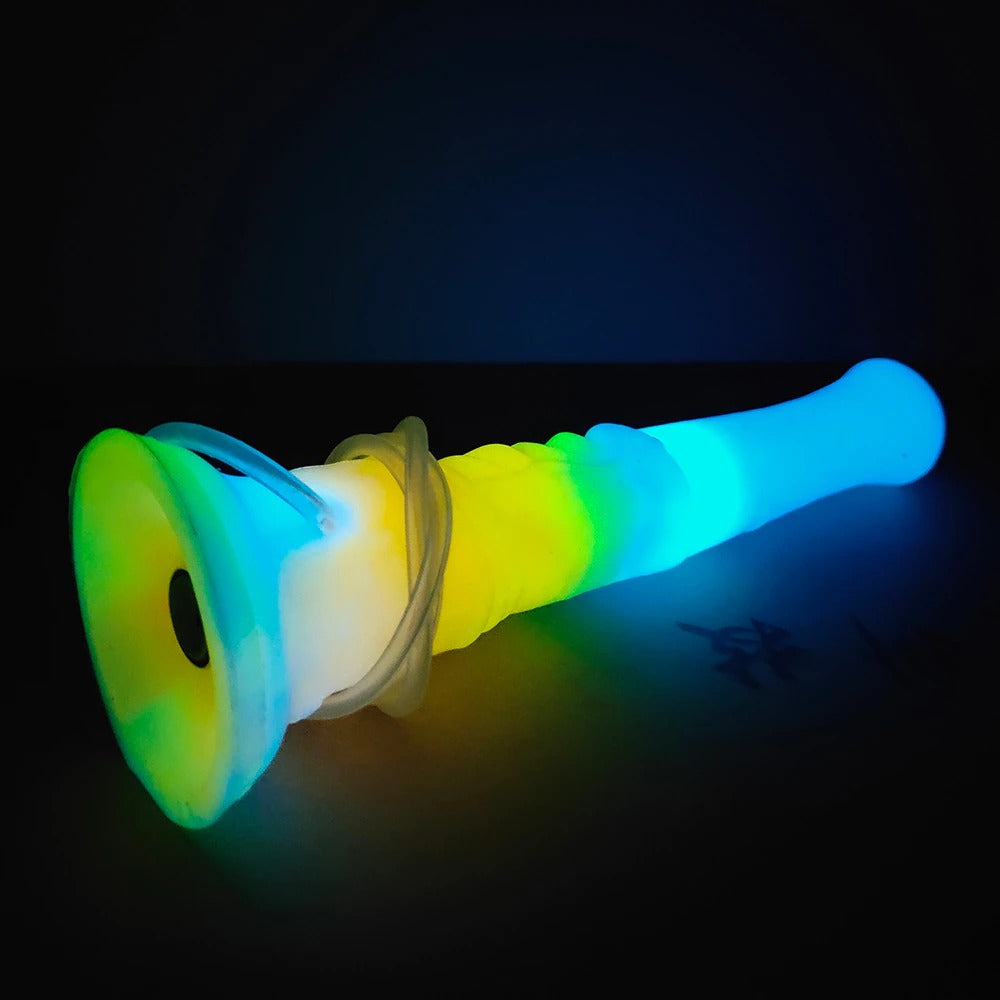 Front view of the flared base on a blue-to-rainbow luminous vibrator