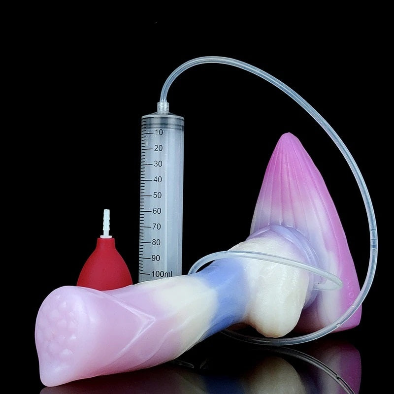 Pastel white-to-pink fantasy werewolf sex toy with clear hose and measuring cylinder