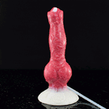 Tall red-pink canine-shaped sex toy with white base and clear tube nearby