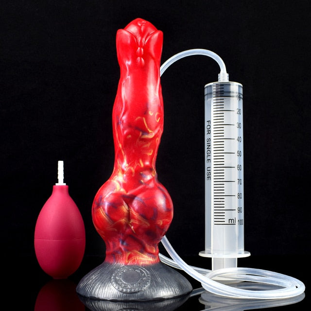 Red canine-shaped sex toy with squirting tube, syringe-style gauge, and bulb