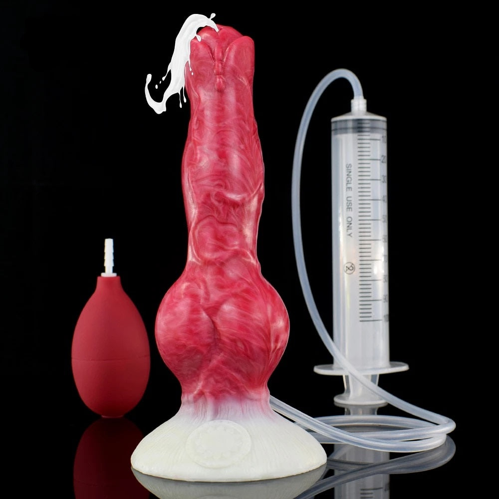 Pink canine-shaped sex toy with tubing, syringe-style gauge, and pump bulb