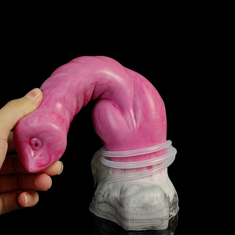 Curled wolf-shaped dildo with pink head and gray base, close-up