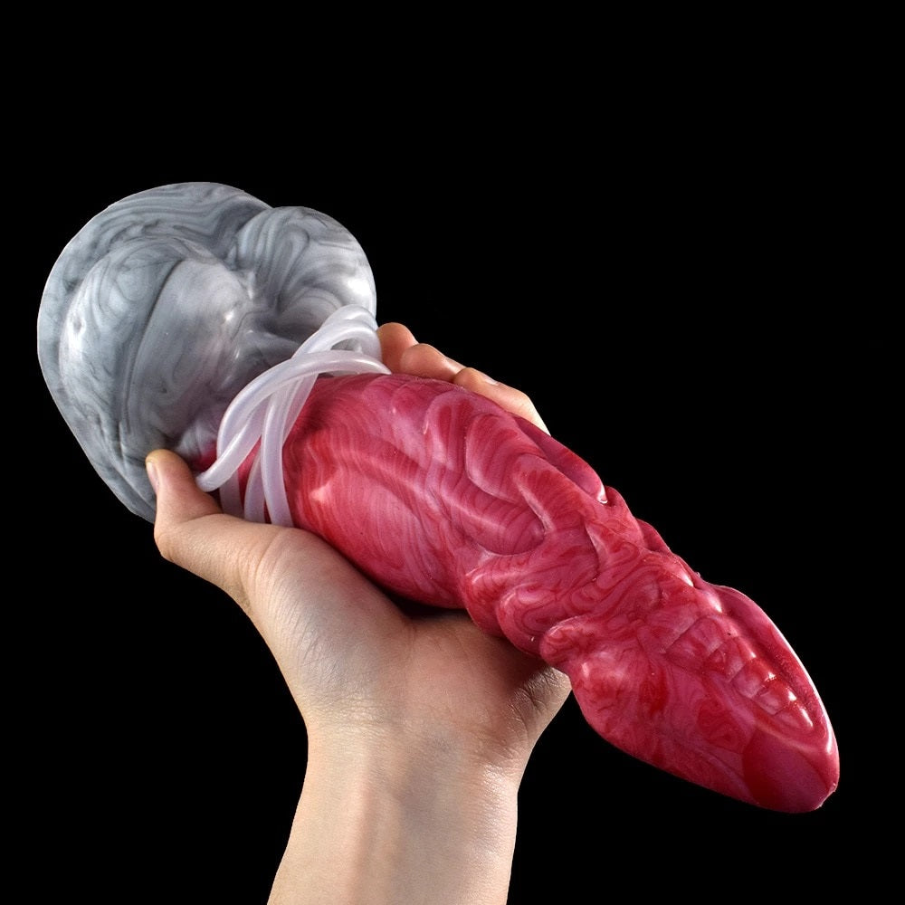 Gaius Dildo rosafarben, Nahansicht der Spitze und transparenter Ringmanschette
