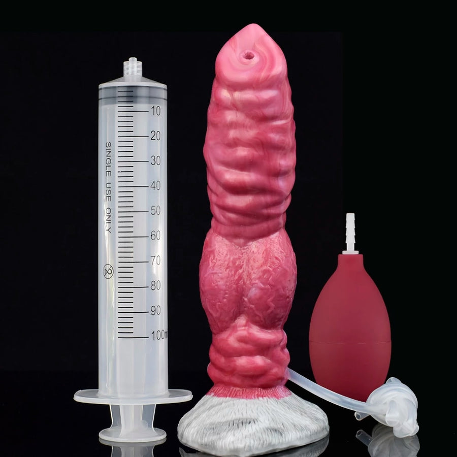 Pink realistic dog-knot style sex toy with measuring syringe and accessory bulbs.