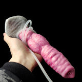 Gory pink dog-knot dildo with gray tail base and clear tube