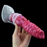 Gory pink realistic dog-knot dildo with gray tail base and suction ring