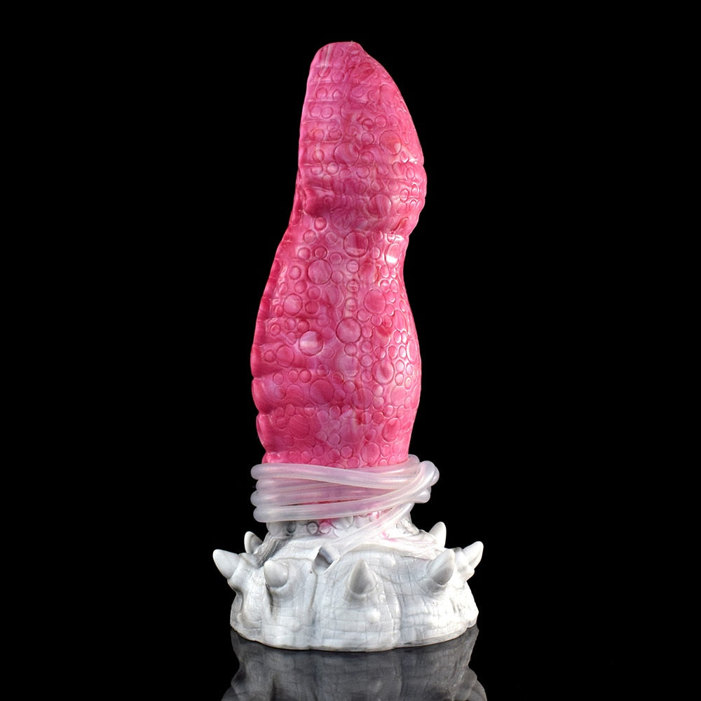 Octopus tentacle dildo side view, hot pink textured body with white base ring (Gory)