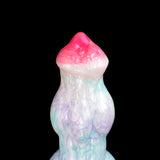 Front view of pastel blue dildo with red cap-like tip and patterned midsection.