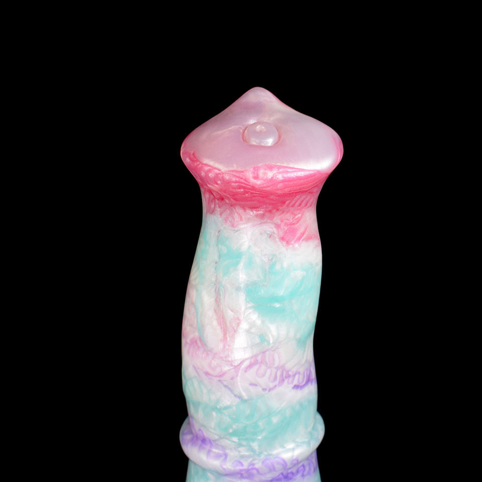 Close-up of horse-head top on pastel blue and purple sex toy with pink crown