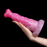 Pegasus-Dildo in Pink, seitliche Nahansicht mit breitem, geripptem Fuß