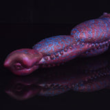 Double-ended equine dildo side view, purple-blue speckled texture and central ridges