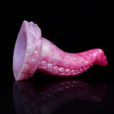 Octopus tentacle butt plug with flared base, curved pink design and suction details