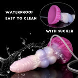 Alien double-knot dildo with suction base; light lilac body and pink cup end.