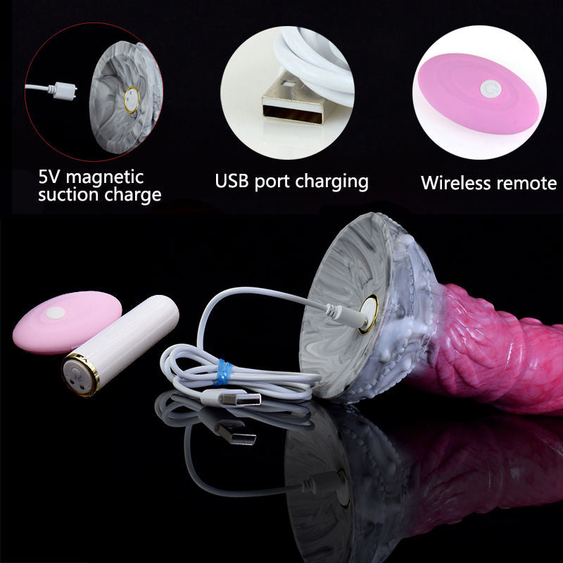 Gray-base vibrator with pink wireless remote puck and USB charging cable set.