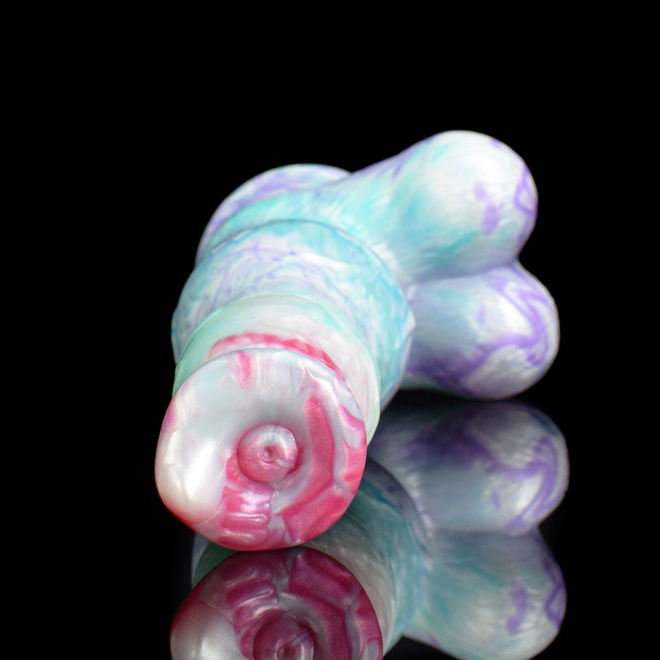 Giant werewolf dildo close-up of tip and knot, pastel blue and purple swirls