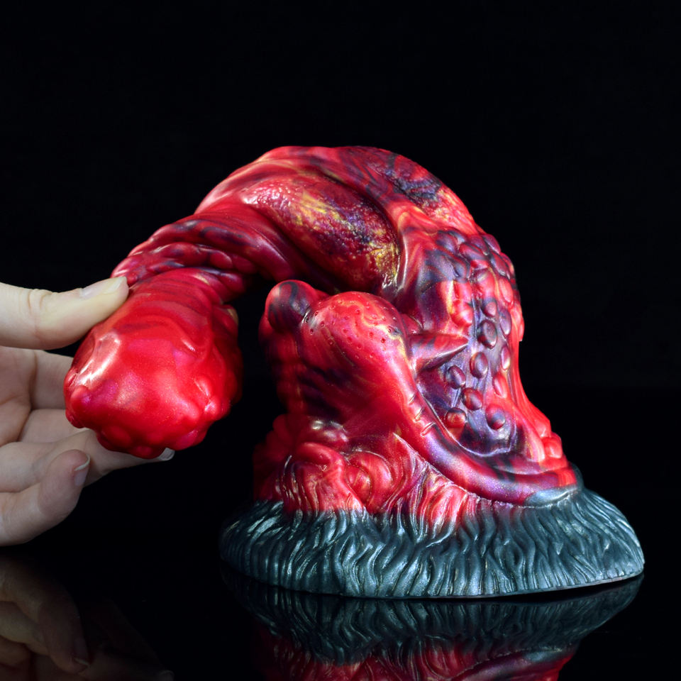 Curved monster tongue anal dildo, red textured body and blue-gray suction base