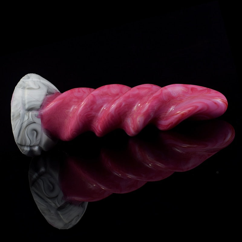 Pink swirled spiral tentacle dildo with ridged surface and white marble-look base, angled view