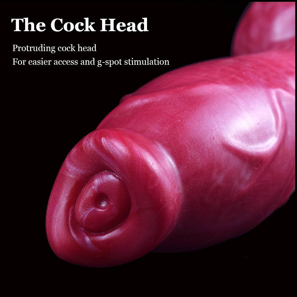 Close-up of pink molded head on knotted dog-themed dildo