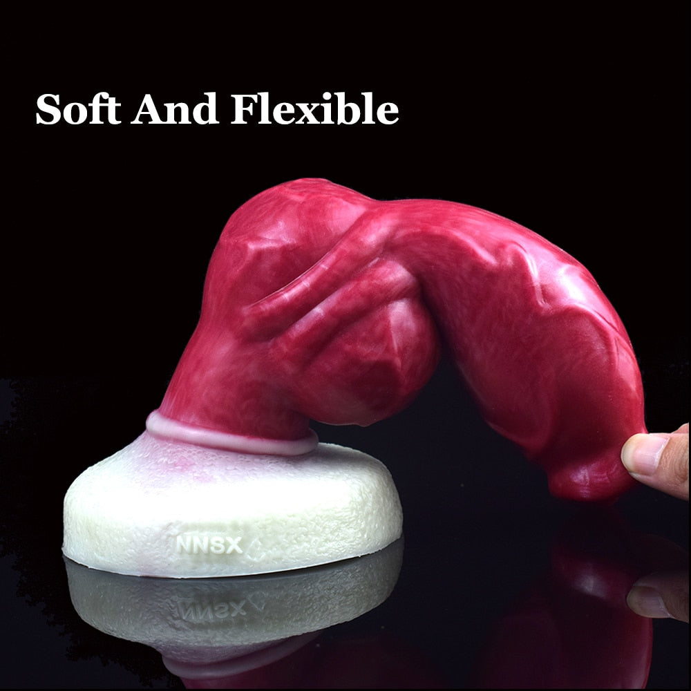 Pink knotted dog-themed dildo, curved midsection with white suction base