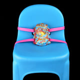 Octopus grinder toy centered on blue base with pink double straps