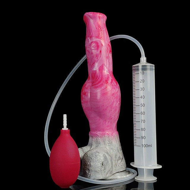 Pink dog-shaped sex toy with clear tube, syringe-style pump, and suction base.